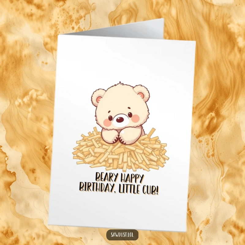 Funny Free Printable Birthday Card: A fluffy bear cub playing joyfully in wood shavings. Adorable and hilarious downloadable art.
